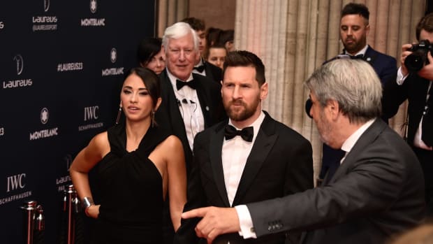 Lionel Messi pictured (center) with wife Antonela Roccuzzo (left) at the 2023 Laureus World Sports Awards in Paris