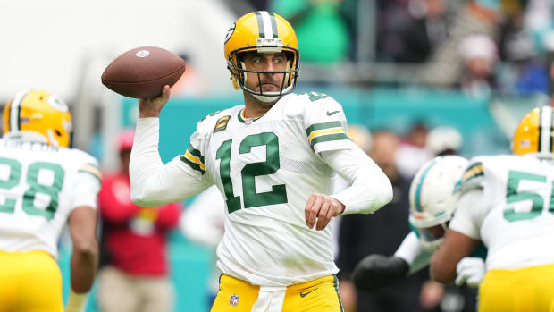 Quarterback Aaron Rodgers attempts a pass against the Miami Dolphins in 2022