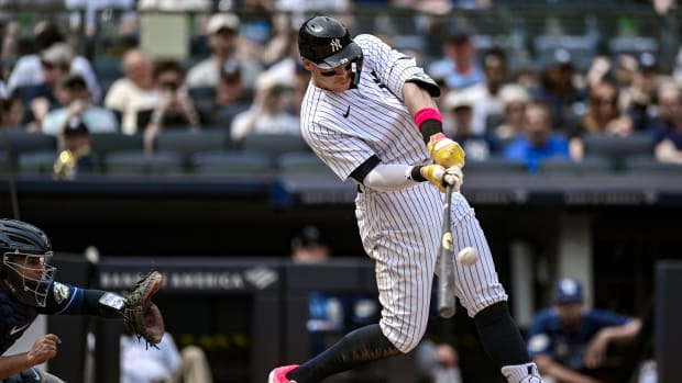 May 13, 2023; Bronx, New York, USA; New York Yankees center fielder Aaron Judge (99) hits a two-run home run against the Tampa Bay Rays during the fifth inning at Yankee Stadium.