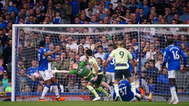 Ilkay Gundogan pictured (center) scoring for Manchester City against Everton in May 2023
