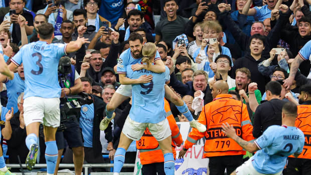 Players and supporters of Manchester City pictured celebrating after an early goal put them 1-0 up against Real Madrid in the second leg of their Champions League semi-final in May 2023