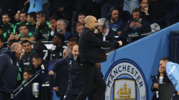 Pep Guardiola pictured celebrating during Manchester City's 4-0 victory over Real Madrid in May 2023 - his 100th Champions League win as a manager