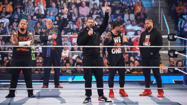 Roman Reigns and The Bloodline in the ring on SmackDown
