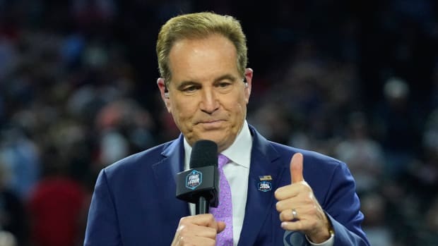 CBS play-by-play announcer Jim Nantz gives a thumbs up during his last NCAA March Madness broadcast in 2023.