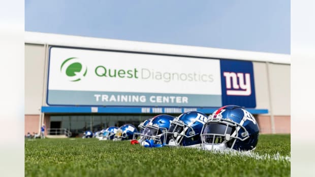 New York Giants helmets outside of their practice field.