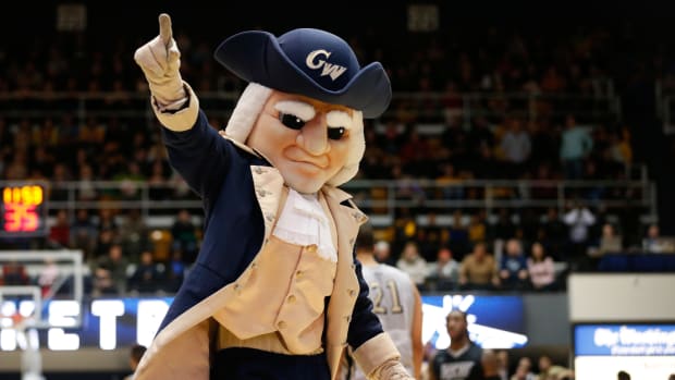 Feb 14, 2015; Washington, DC, USA; George Washington Colonials mascot dances on the court during a stoppage in play against the Virginia Commonwealth Rams at Charles E. Smith Center.