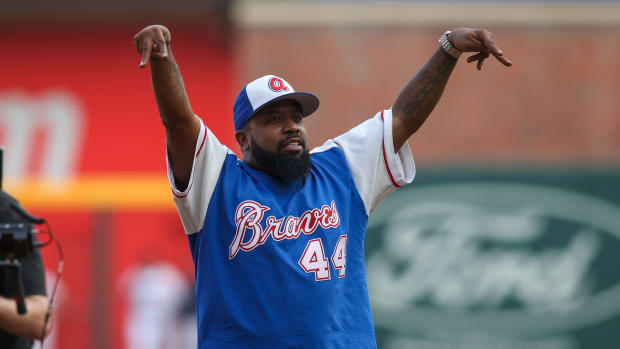 May 25, 2023; Atlanta, Georgia, USA; Rapper Big Boi of Outkast throws out the first pitch prior to a game between the Atlanta Braves and Philadelphia Phillies in at Truist Park.