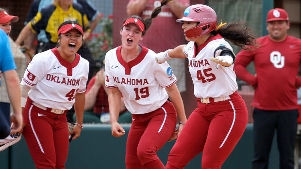 Oklahoma's Haley Lee (45) celebrates a grand slam in the fifth inning during the NCCA Norman Super Regional softball game between the University of Oklahoma Sooners and the Clemson Tigers at Marita Hynes Field in Norman, Okla., Friday, May, 26, 2023.