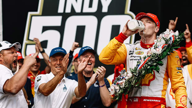 Cold milk never tasted so good: Josef Newgarden chugs whole milk (his drink of choice, he says) after winning the 107th Running of the Indianapolis 500 on Sunday. Photo courtesy IndyCar.