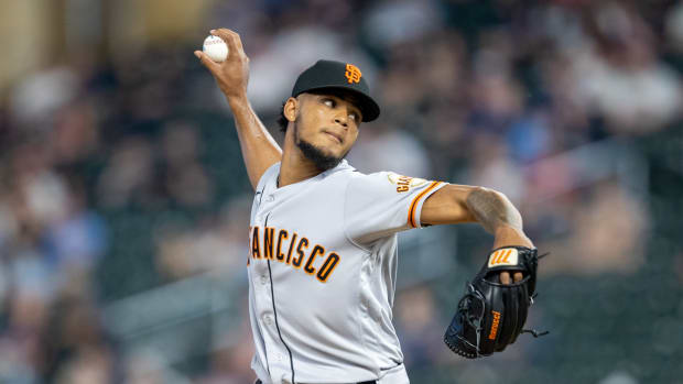 SF Giants relief pitcher Camilo Doval delivers a pitch in the ninth inning against the Minnesota Twins. (2023)