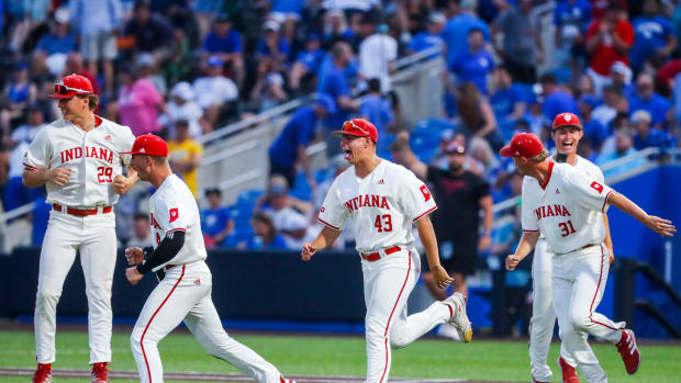 The Indiana bench celebrate after Phillip Glasser's catch in the ninth inning sealed the win as the Hoosiers defeated Kentucky 5-3 Saturday night in the 2023 NCAA Regional at Kentucky Proud Park in Lexington. June 3, 2023.