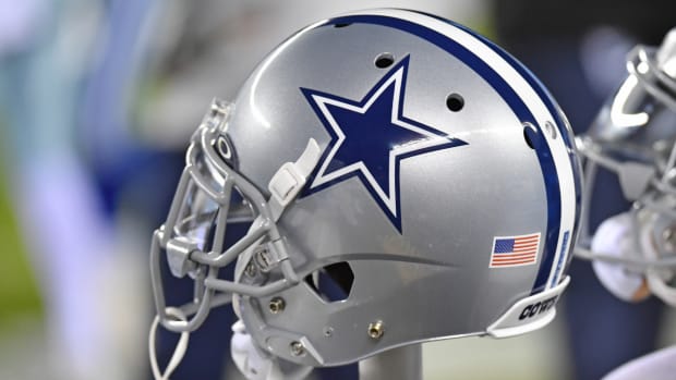 A Cowboys helmet is seen on the sidelines during a game in 2022.