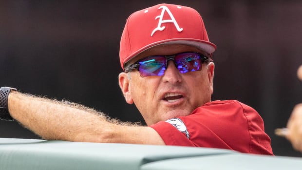 Razorbacks coach Dave Van Horn in the dugout during Sunday afternoon's game against TCU.