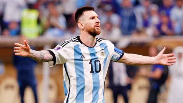 Argentina’s Lionel Messi reacts to shooting a penalty goal in the 2022 World Cup final.