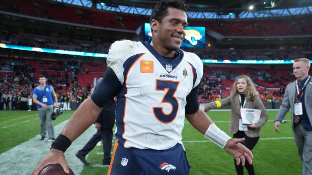 Oct 30, 2022; London, United Kingdom; Denver Broncos quarterback Russell Wilson (3) poses after an NFL International Series game against the Jacksonville Jaguars at Wembley Stadium. The Bronco defeated the Jaguars 21-17. Mandatory Credit: Kirby Lee-USA TODAY Sports