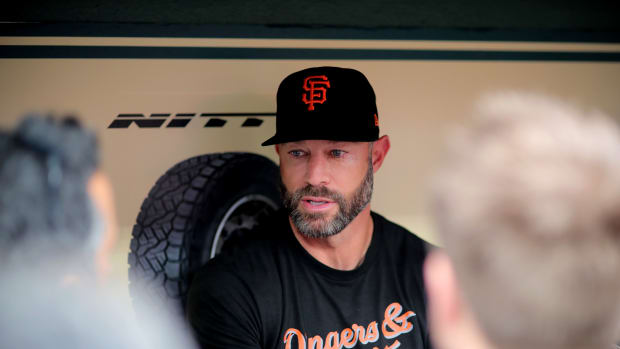 SF Giants manager Gabe Kapler answers questions from the media in the dugout prior to a game against the Houston Astros. (2023)