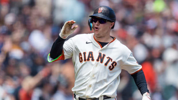 SF Giants designated hitter Joc Pederson runs the bases after hitting a two-run home run against the Chicago Cubs on June 11, 2023.