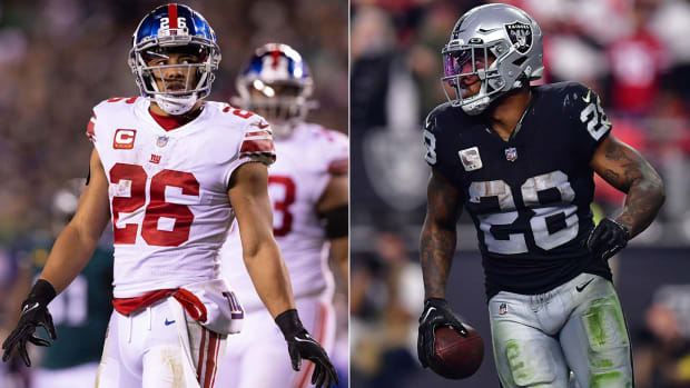 Saquon Barkley and Josh Jacobs are in contract disputes with the Giants and Raiders after being given the franchise tag.