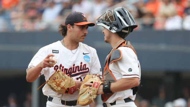 Nick Parker and Kyle Teel talk on the mound during the Virginia baseball game against Duke in game 1 of the Charlottesville Super Regional at the 2023 NCAA Baseball Tournament at Disharoon Park.