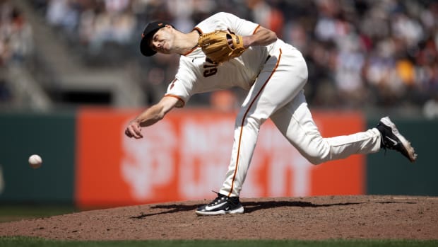 SF Giants reliever Tyler Rogers delivers a pitch at Oracle Park (2023)