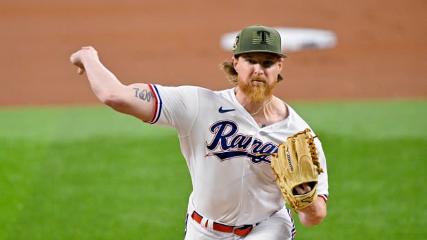 May 20, 2023; Arlington, Texas, USA; Texas Rangers starting pitcher Jon Gray (22) pitches against the Colorado Rockies during the first inning at Globe Life Field. Mandatory Credit: Jerome Miron-USA TODAY Sports
