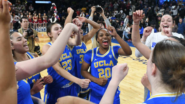 Mar 3, 2023; Las Vegas, NV, USA; UCLA Bruins celebrate the win over the Stanford Cardinal at Michelob Arena.