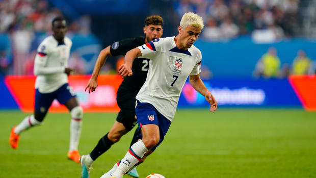 USA forward Giovanni Reyna (7) moves the ball against Canada during the first half at Allegiant Stadium.