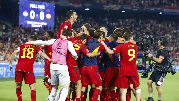 Players from the Spain national team pictured celebrating after beating Croatia in a penalty shootout to win the 2023 UEFA Nations League final
