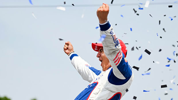 A triumphant Alex Palou celebrates after winning his third race of the season, Sunday at Road America. Photo courtesy IndyCar.