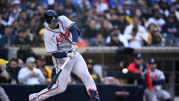 Apr 17, 2023; San Diego, California, USA; Atlanta Braves third baseman Austin Riley (27) hits a two-run home run against the San Diego Padres during the first inning at Petco Park.