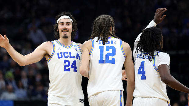 Mar 16, 2023; Sacramento, CA, USA; UCLA Bruins guard/forward Jaime Jaquez (24) and forward Mac Etienne (12) react in the second half against the UNC Asheville Bulldogs at Golden 1 Center.