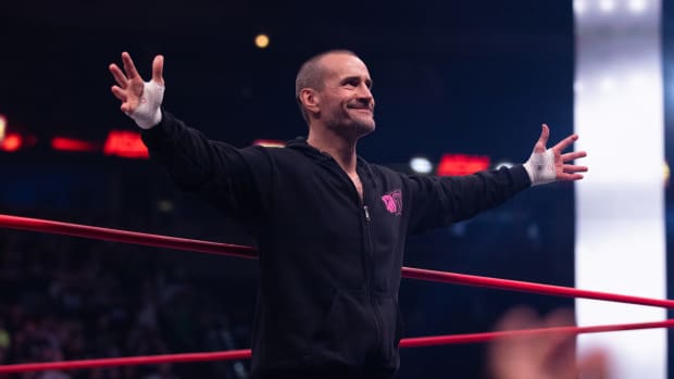 CM Punk greets the crowd at AEW Collision