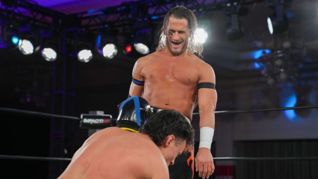 Alex Shelley taunts an opponent