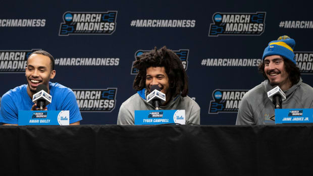 Mar 15, 2023; Sacramento, CA, USA; UCLA Bruins guard Amari Bailey (5), guard Tyger Campbell (10), and guard/forward Jaime Jaquez (24) address the media in a press conference during practice day at Golden 1 Center.
