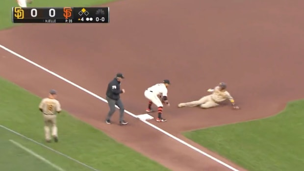 Manny Machado is tagged out at third