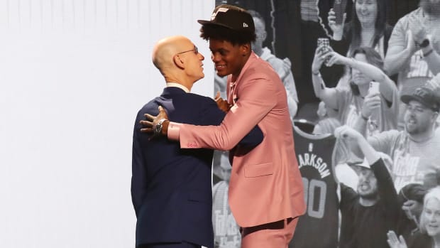 Taylor Hendricks (UCF) is greeted by NBA commissioner Adam Silver after being selected ninth by the Utah Jazz in the first round of the 2023 NBA Draft at Barclays Arena.