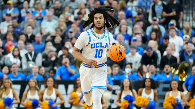 Mar 23, 2023; Las Vegas, NV, USA; UCLA Bruins guard Tyger Campbell (10) dribbles the ball against the Gonzaga Bulldogs during the first half at T-Mobile Arena.