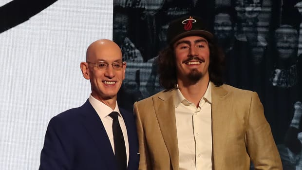 Jun 22, 2023; Brooklyn, NY, USA; Jaime Jaquez Jr (UCLA) with NBA commissioner Adam Silver after being selected eighteenth by the Miami Heat in the first round of the 2023 NBA Draft at Barclays Arena.
