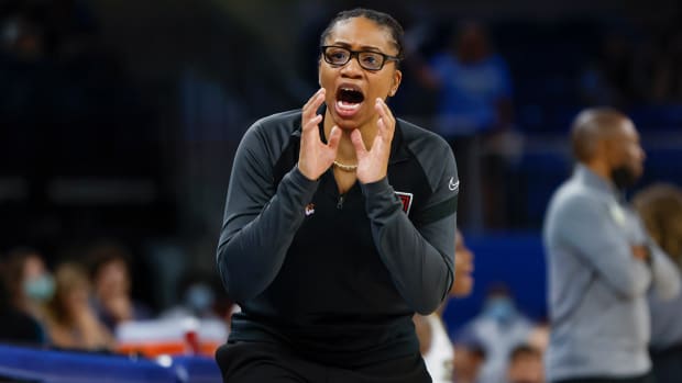 Atlanta Dream coach Tanisha Wright yells to the team during the first half of a WNBA game against the Chicago Sky at Wintrust Arena.