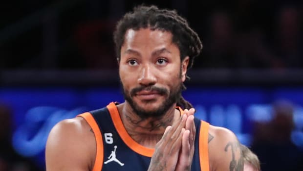 Knicks guard Derrick Rose reacts to a play.