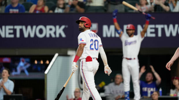 Texas Rangers utility player Ezequiel Duran watches on his home run against the Detroit Tigers during a game in 2023 at Globe Life Field.