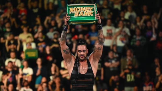 Damian Priest celebrates his Money in the Bank win