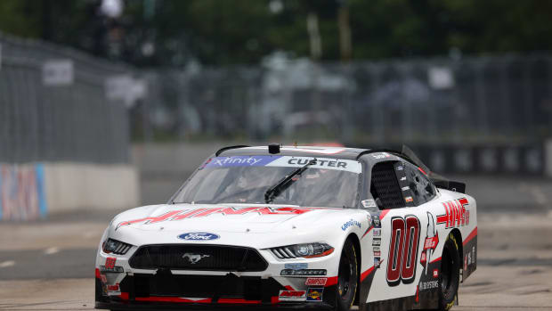 Cole Custer is named the winner of the rain-shortened NASCAR Xfinity Series The Loop 121 at the Chicago Street Course in downtown Chicago. (Photo by Michael Reaves/Getty Images)