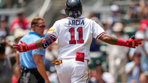 Jul 2, 2023; Cumberland, Georgia, USA; Atlanta Braves shortstop Orlando Arcia (11) reacts after hitting a home run against the Miami Marlins during the second inning at Truist Park.
