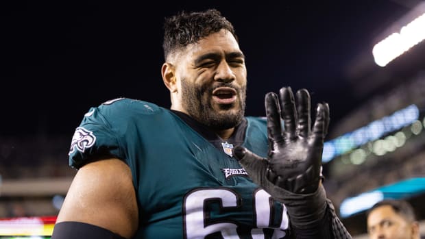 Eagles offensive tackle Jordan Mailata (68) on the sidelines in the final minutes of a victory against the Giants in an NFC divisional round game at Lincoln Financial Field.