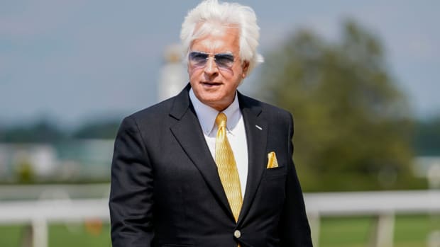 Trainer Bob Baffert walks off the track after his horse Arabian Lion won The Woody Stephens ahead of the Belmont Stakes horse race Saturday, June 10, 2023, at Belmont Park in Elmont, N.Y. (AP Photo/Mary Altaffer)