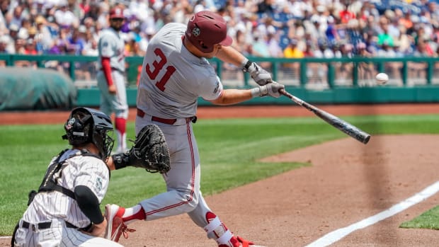 Jun 17, 2023; Omaha, NE, USA; Stanford Cardinal first baseman Carter Graham (31) hits an RBI single against the Wake Forest Demon Deacons during the third inning at Charles Schwab Field Omaha. Mandatory Credit: Dylan Widger-USA TODAY Sports