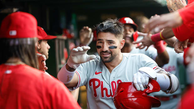 Jun 28, 2023; Chicago, Illinois, USA; Philadelphia Phillies right fielder Nick Castellanos (8) celebrates with teammates after hitting a three-run home run against the Chicago Cubs during the second inning at Wrigley Field.
