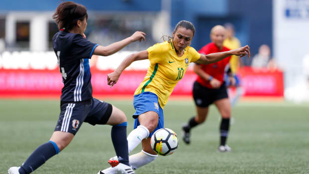Brazil forward Marta passes against Japan during the SheBelieves Cup.