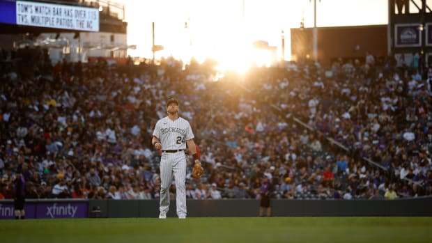 Jun 30, 2023; Denver, Colorado, USA; Colorado Rockies third baseman Ryan McMahon (24) in the middle of the eighth inning against the Detroit Tigers at Coors Field.